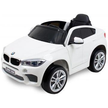 BMW X6 kinderauto wit zijaanzicht banden deur stoel