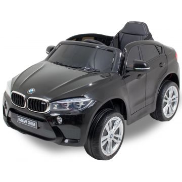 BMW X6 kinderauto zwart dashboard stuur motorkap gaspedaal zijaanzicht